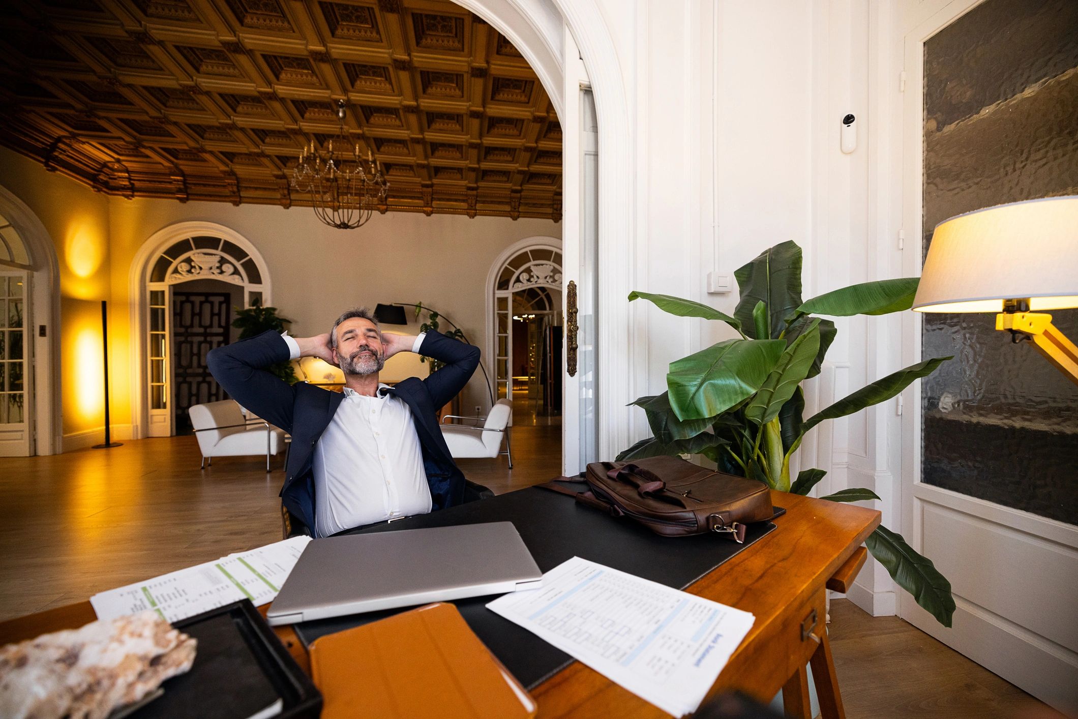 Calm professional seated in a modern office