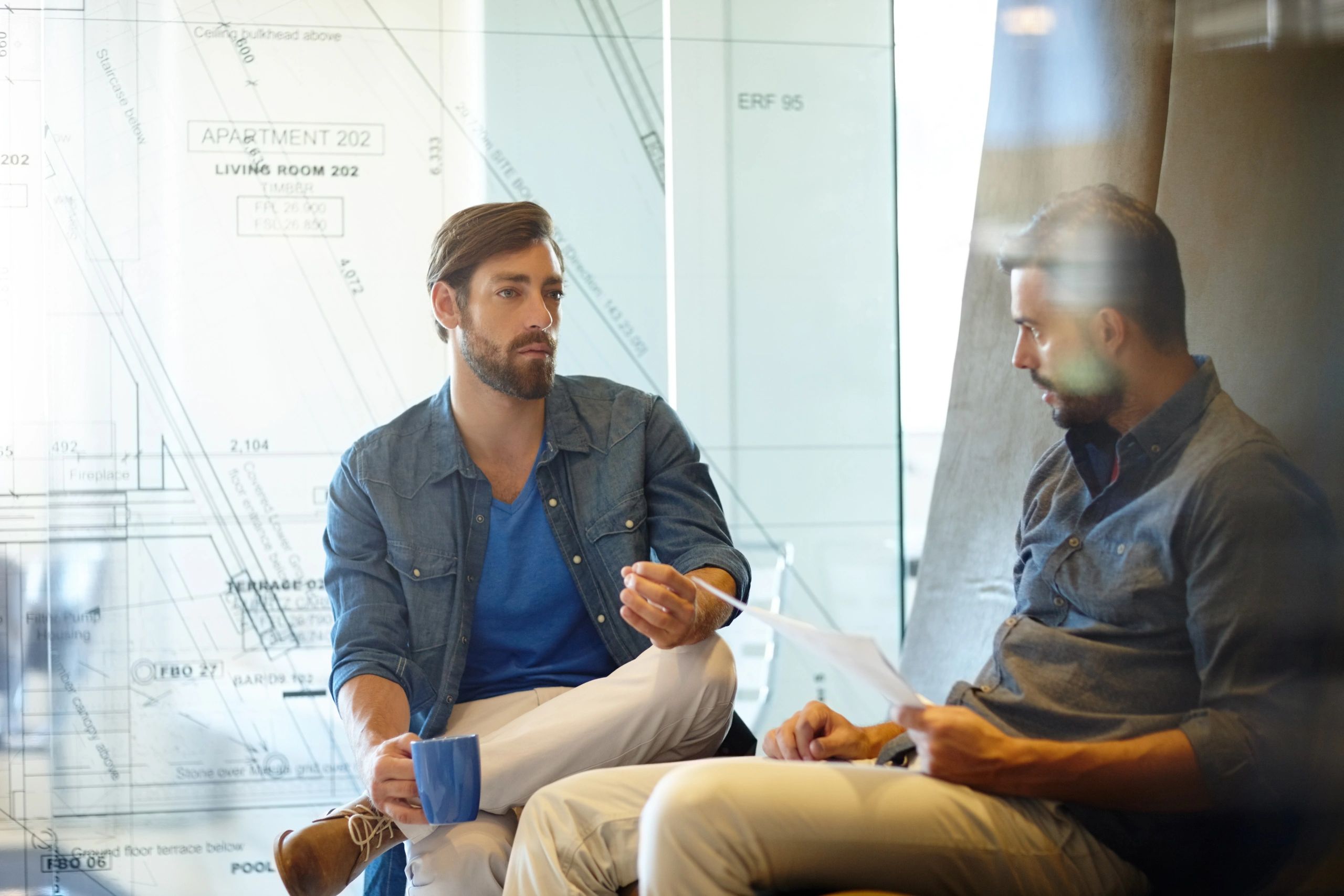 Two professionals in conversation